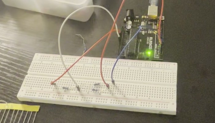 Resistor network on a breadboard wired to an Arduino UNO